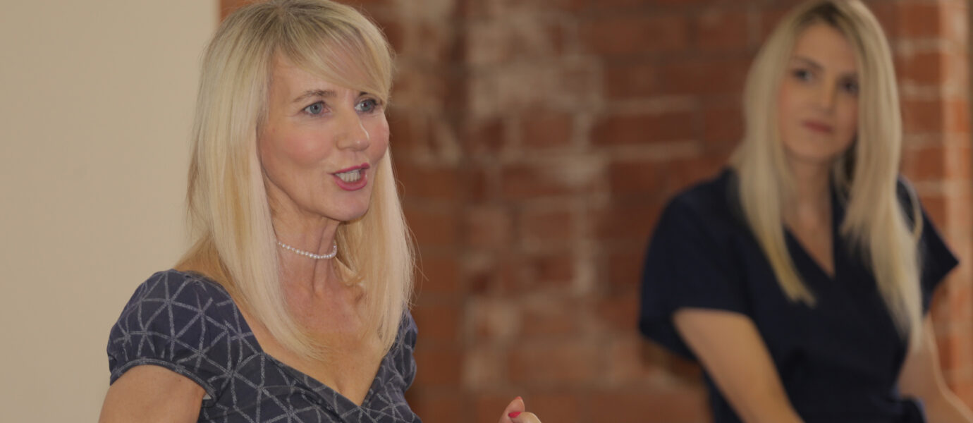 COMMUNITIES IN TRANSITION: Experiences of living and working in areas of paramilitary control captured in new research